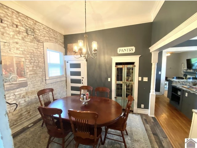 1722 Jefferson St, Paducah, KY 42001 - dining area featuring a chandelier, dark wood-type flooring, and baseboards