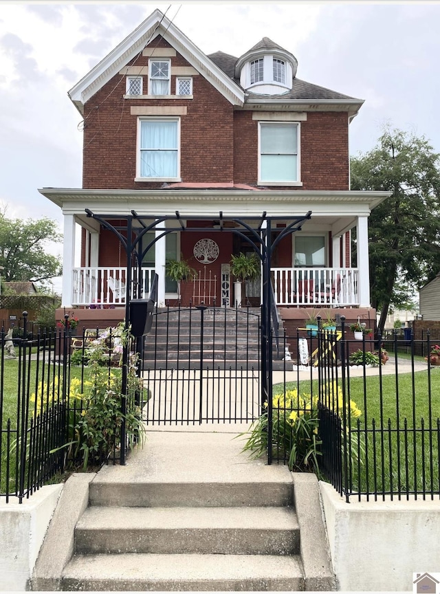 1722 Jefferson St, Paducah, KY 42001 - view of front of home with covered porch and brick siding