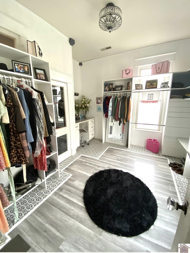 1722 Jefferson St, Paducah, KY 42001 - walk in closet featuring wood finished floors