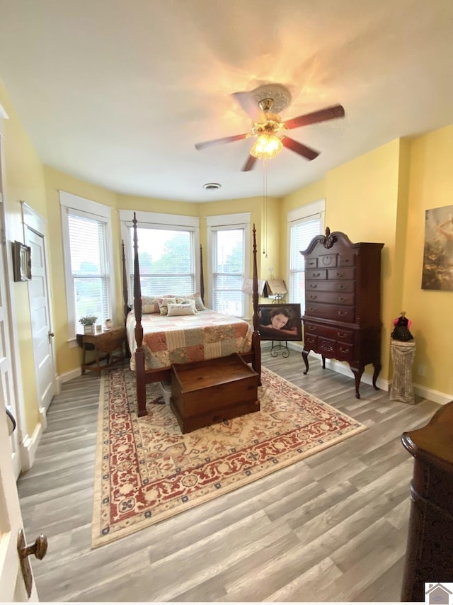 1722 Jefferson St, Paducah, KY 42001 - bedroom featuring light wood-style flooring, baseboards, and a ceiling fan