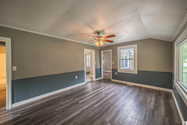 9740 Crotzer Rd, West Paducah, KY 42086 - unfurnished room featuring dark wood finished floors, a textured ceiling, a ceiling fan, vaulted ceiling, and baseboards