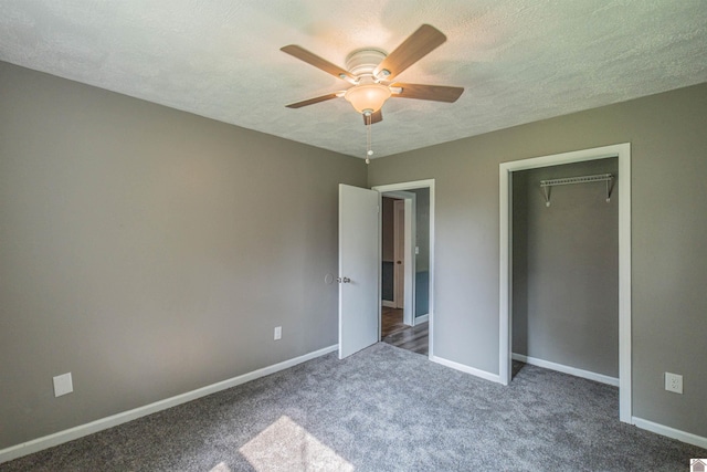 9740 Crotzer Rd, West Paducah, KY 42086 - unfurnished bedroom featuring carpet, a textured ceiling, baseboards, a ceiling fan, and a closet