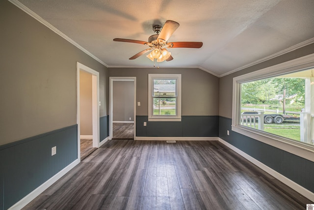 9740 Crotzer Rd, West Paducah, KY 42086 - spare room with dark wood-style floors, vaulted ceiling, a ceiling fan, baseboards, and crown molding