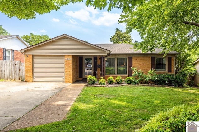 1310 Hilltop Dr, Mayfield, KY 42066 - single story home featuring brick siding, a garage, and driveway