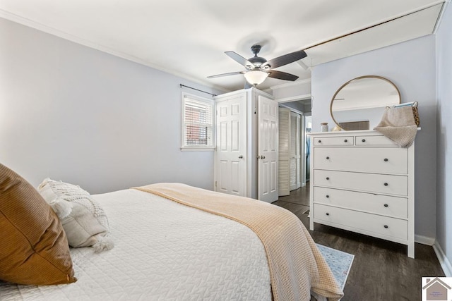 1310 Hilltop Dr, Mayfield, KY 42066 - bedroom featuring dark wood-style flooring, ornamental molding, a ceiling fan, and baseboards