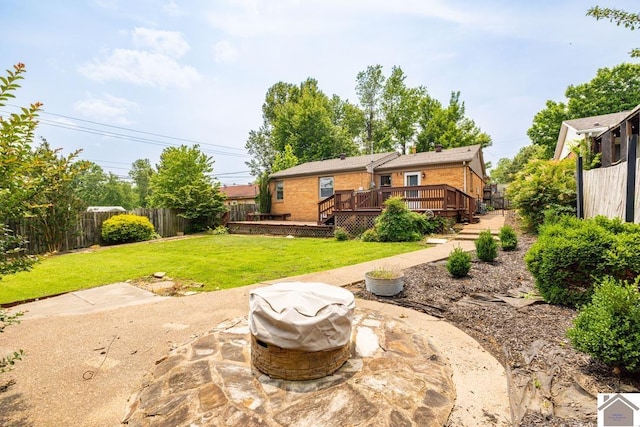 1310 Hilltop Dr, Mayfield, KY 42066 - rear view of property featuring a deck, a patio, and brick siding