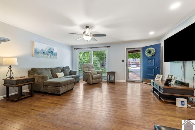 1310 Hilltop Dr, Mayfield, KY 42066 - living room featuring hardwood / wood-style floors, ornamental molding, a ceiling fan, and baseboards