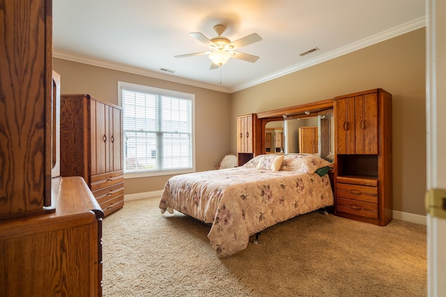 2492 Lakewood Dr, Paducah, KY 42003 - bedroom with light carpet, crown molding, baseboards, and a ceiling fan