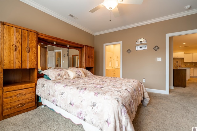 2492 Lakewood Dr, Paducah, KY 42003 - bedroom featuring crown molding, light carpet, baseboards, ensuite bath, and a ceiling fan
