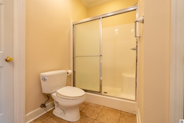 2492 Lakewood Dr, Paducah, KY 42003 - full bathroom with a stall shower, tile patterned flooring, toilet, and ornamental molding