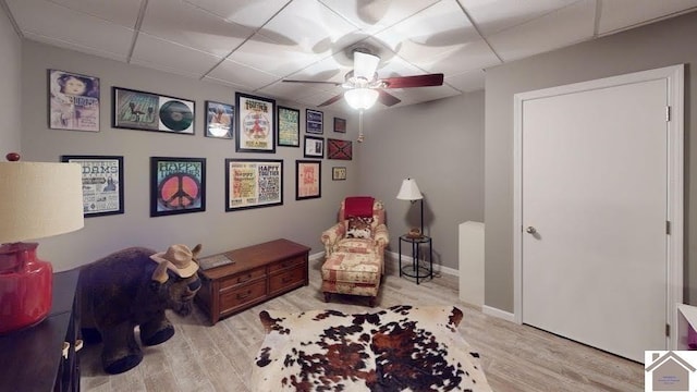144 Canton Heights 2 Cir, Cadiz, KY 42211 - living area featuring a drop ceiling, wood finished floors, ceiling fan, and baseboards