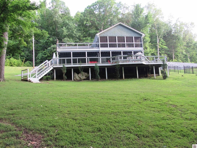 144 Canton Heights 2 Cir, Cadiz, KY 42211 - back of house featuring a wooden deck, a sunroom, a lawn, and stairs