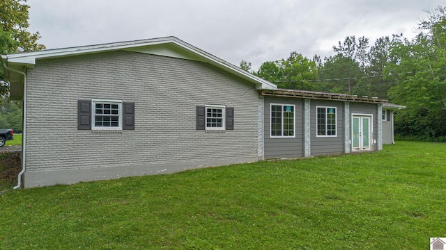 3561 Beal, Hardin, KY 42048 - view of home's exterior featuring a lawn