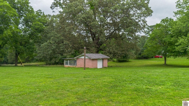 3561 Beal, Hardin, KY 42048 - view of green lawn with an outdoor structure