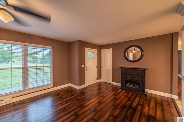 3561 Beal, Hardin, KY 42048 - unfurnished living room featuring dark wood-style flooring, ceiling fan, and a fireplace