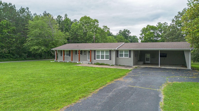 3561 Beal, Hardin, KY 42048 - single story home with a carport, driveway, and a front lawn