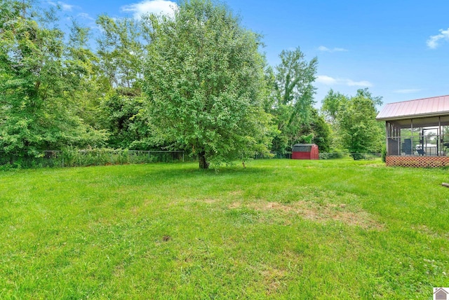 332 Meadowbrook, Cadiz, KY 42211 - view of green lawn featuring a sunroom
