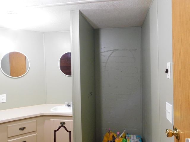 920 State Route 506, Marion, KY 42064 - bathroom with vanity and a textured ceiling