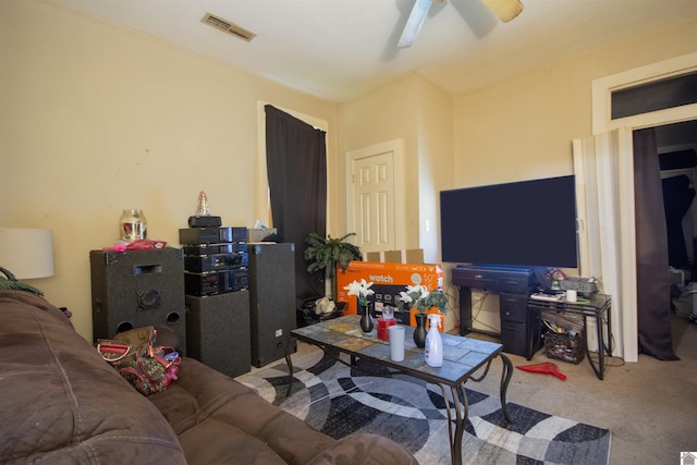 1719 Broad St, Paducah, KY 42001 - living room with a ceiling fan and carpet
