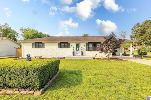 2145 Blankenship, Paducah, KY 42003 - ranch-style house with driveway, a front yard, brick siding, and an attached carport