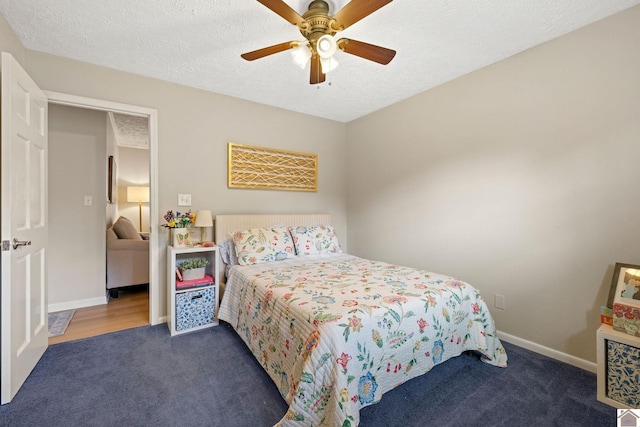 2145 Blankenship, Paducah, KY 42003 - carpeted bedroom featuring a ceiling fan and a textured ceiling