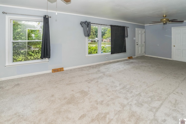 200 Millbrooke Dr, Hopkinsville, KY 42240 - empty room with ceiling fan, carpet, healthy amount of natural light, and crown molding