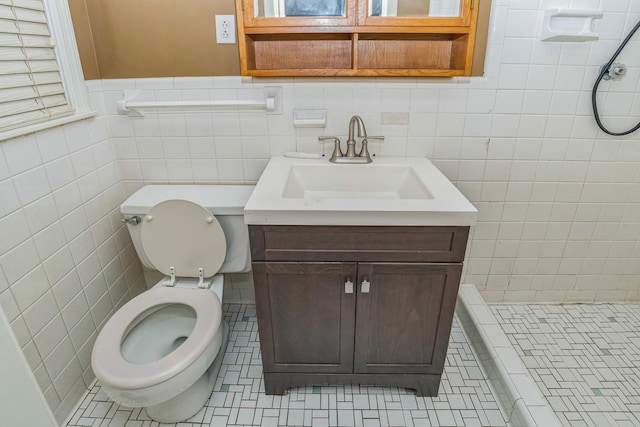 200 Millbrooke Dr, Hopkinsville, KY 42240 - bathroom with tile walls, vanity, a tile shower, and tile patterned floors