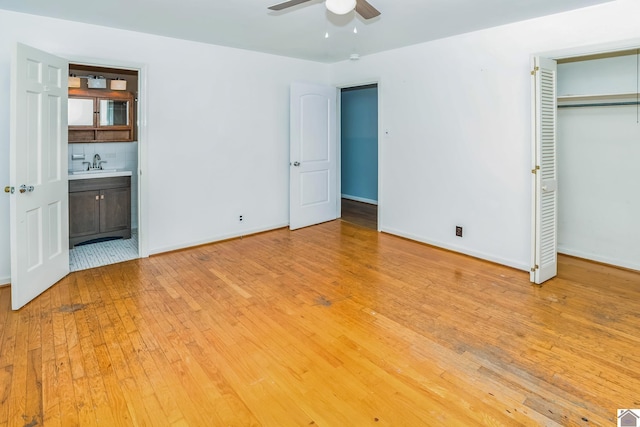200 Millbrooke Dr, Hopkinsville, KY 42240 - unfurnished bedroom with light wood-type flooring, ensuite bathroom, a closet, and a ceiling fan