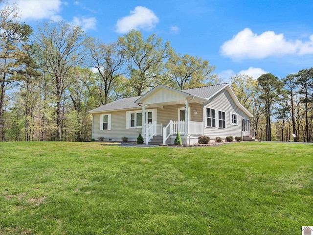 2488 Cypress Trl, New Concord, KY 42076 - view of front facade with a front lawn, covered porch, and crawl space