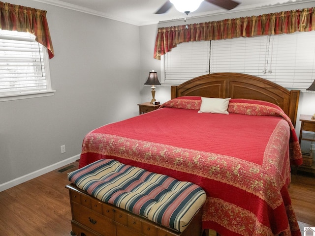 2488 Cypress Trl, New Concord, KY 42076 - bedroom with wood finished floors, ornamental molding, and a ceiling fan