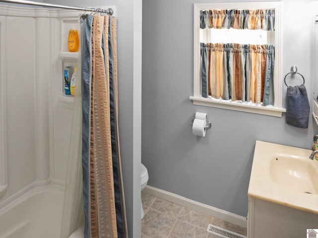 2488 Cypress Trl, New Concord, KY 42076 - bathroom featuring vanity, shower / tub combo with curtain, and tile patterned floors