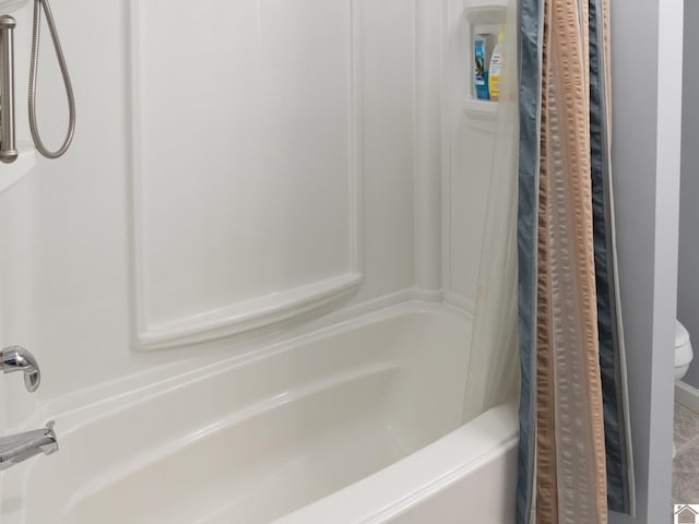 2488 Cypress Trl, New Concord, KY 42076 - full bathroom featuring shower / bathtub combination with curtain and toilet