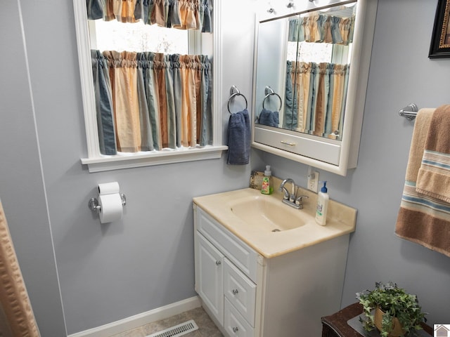 2488 Cypress Trl, New Concord, KY 42076 - bathroom with vanity and baseboards