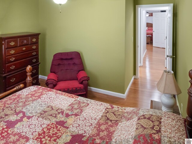 2488 Cypress Trl, New Concord, KY 42076 - bedroom featuring wood finished floors and baseboards