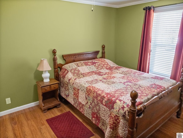 2488 Cypress Trl, New Concord, KY 42076 - bedroom with ornamental molding and wood finished floors
