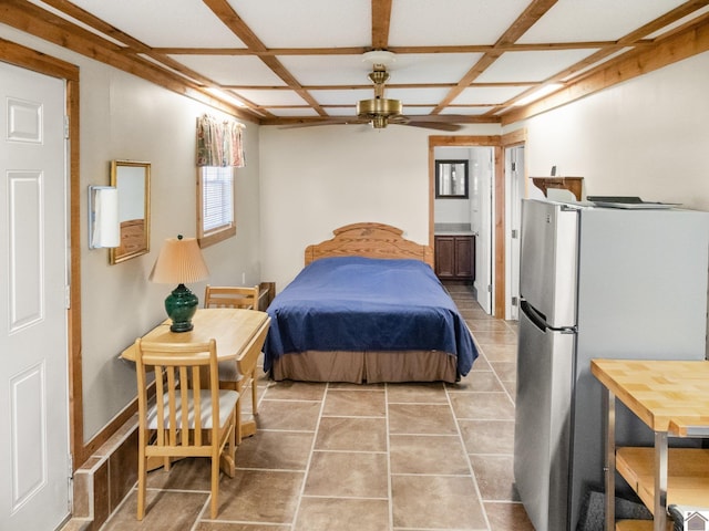 2488 Cypress Trl, New Concord, KY 42076 - bedroom featuring freestanding refrigerator, coffered ceiling, light tile patterned floors, and ensuite bathroom