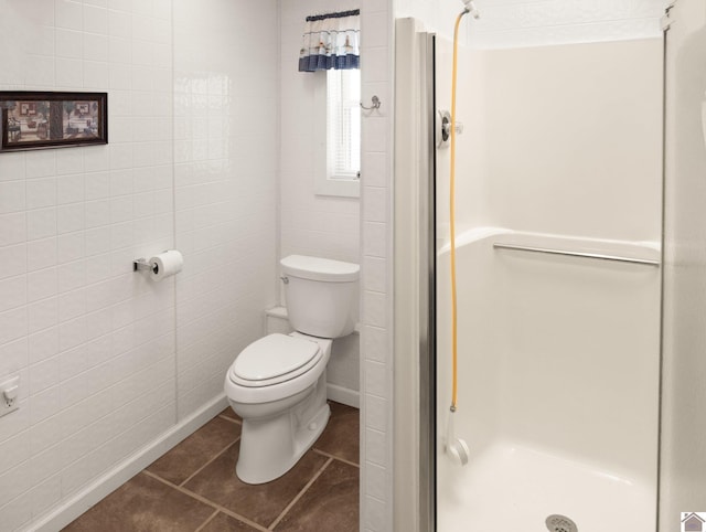 2488 Cypress Trl, New Concord, KY 42076 - bathroom with a shower stall, tile patterned flooring, and tile walls