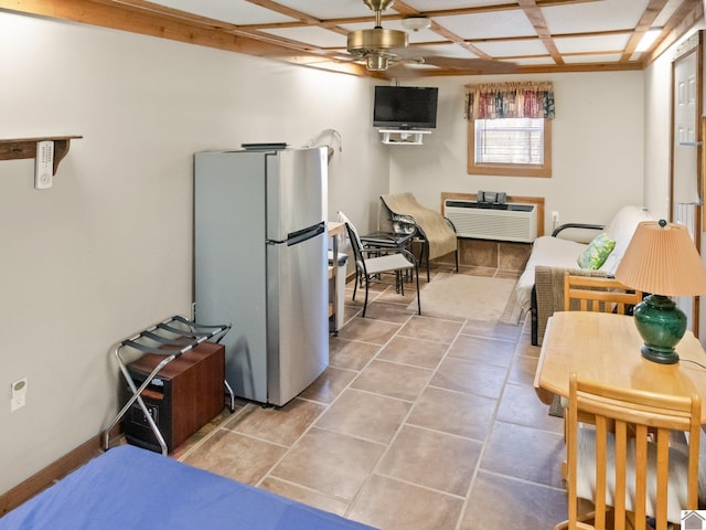 2488 Cypress Trl, New Concord, KY 42076 - kitchen featuring freestanding refrigerator, ceiling fan, an AC wall unit, tile patterned flooring, and coffered ceiling