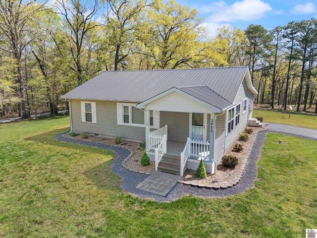 2488 Cypress Trl, New Concord, KY 42076 - view of front of property with a porch, a front yard, a metal roof, and crawl space