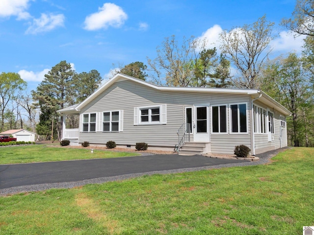 2488 Cypress Trl, New Concord, KY 42076 - back of house featuring entry steps, a lawn, and crawl space