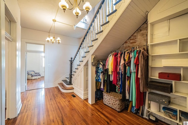 326 N 9th, Paducah, KY 42001 - walk in closet with a chandelier and hardwood / wood-style floors