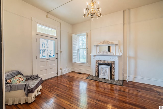 326 N 9th, Paducah, KY 42001 - entrance foyer featuring a chandelier, hardwood / wood-style flooring, and a fireplace