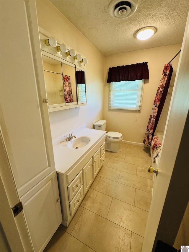 111 Cherry Grove Dr, Benton, KY 42025 - full bathroom featuring vanity, a textured ceiling, tile patterned floors, and shower / bathtub combination with curtain