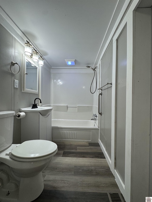 67 Beshear Ln, Princeton, KY 42445 - bathroom with wood finished floors, bathtub / shower combination, and vanity