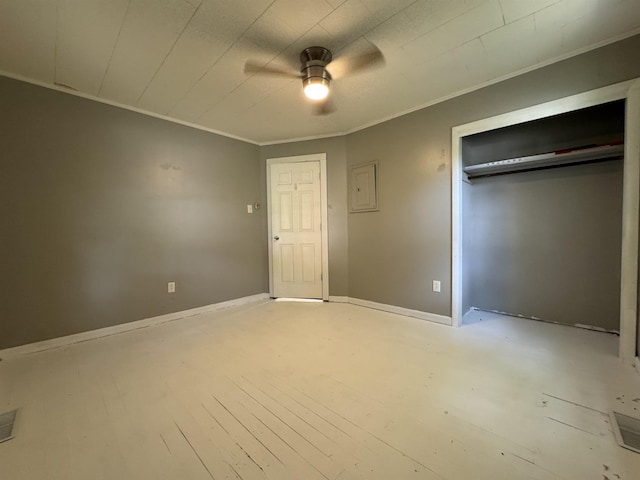 67 Beshear Ln, Princeton, KY 42445 - unfurnished bedroom with crown molding, a closet, ceiling fan, light wood-type flooring, and electric panel