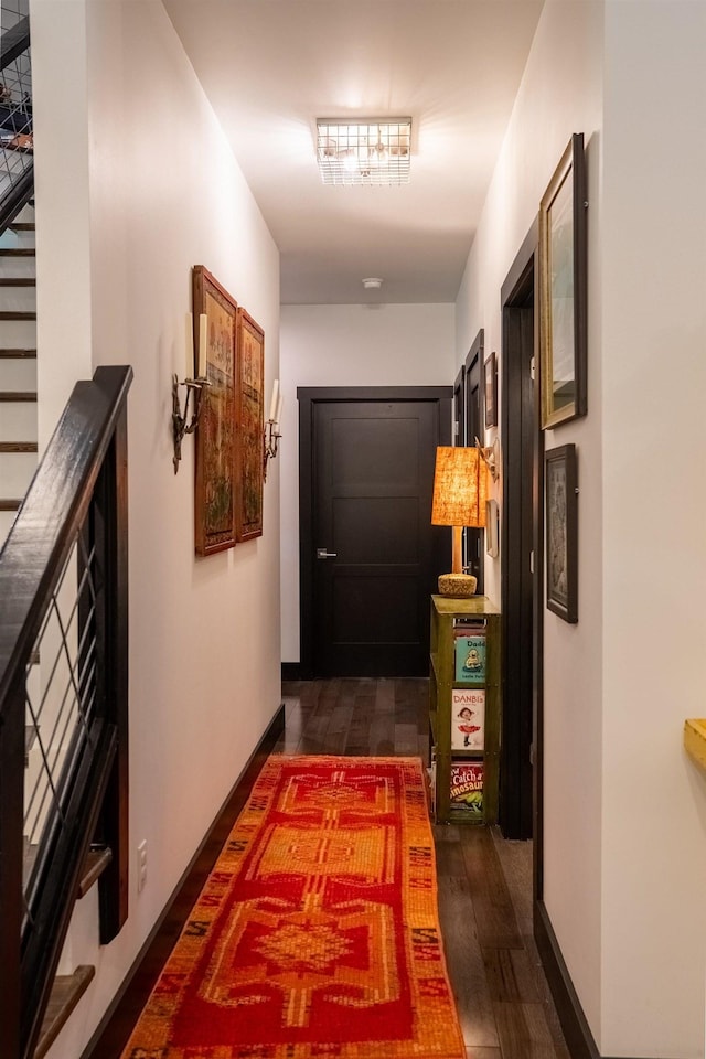 3431 Irvin Cobb Rd, Murray, KY 42071 - hallway featuring dark wood finished floors and stairway