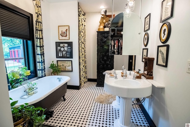 3431 Irvin Cobb Rd, Murray, KY 42071 - full bath with tile patterned floors and a freestanding tub