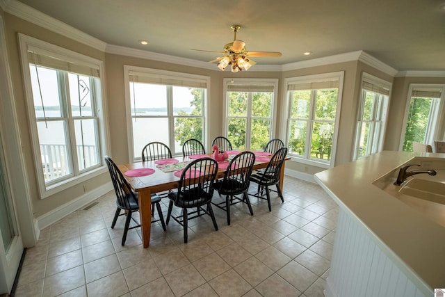129 Wayne Cir, New Concord, KY 42076 - dining area with light tile patterned floors, ceiling fan, recessed lighting, and ornamental molding