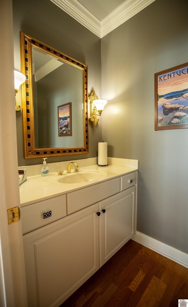 129 Wayne Cir, New Concord, KY 42076 - bathroom featuring ornamental molding, vanity, and wood finished floors