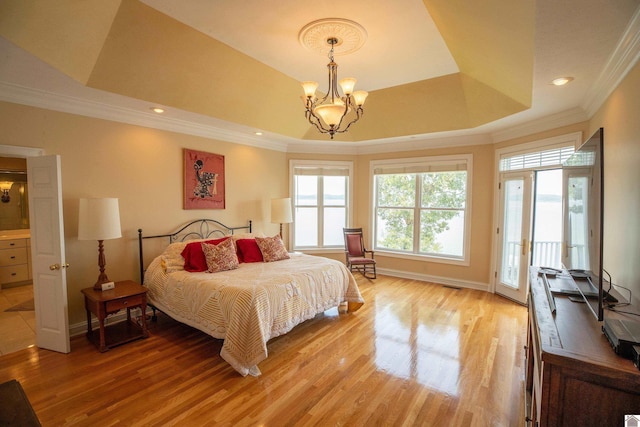 129 Wayne Cir, New Concord, KY 42076 - bedroom featuring access to exterior, light wood finished floors, a tray ceiling, a chandelier, and ornamental molding